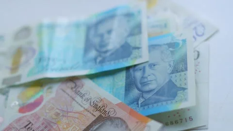 Pile of British Pound Banknotes of £5 £10, £20. Stock Footage 304511864