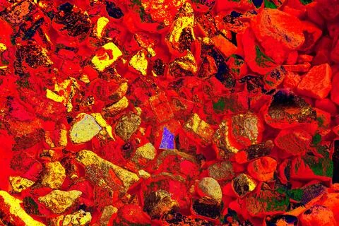 Pile of broken bricks, changed colors. Bright colorful background. Stock Photos