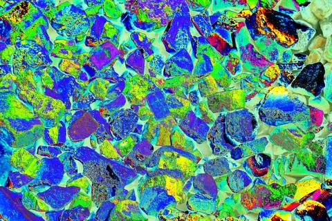 Pile of broken bricks, changed colors. Bright colorful background. Stock Photos