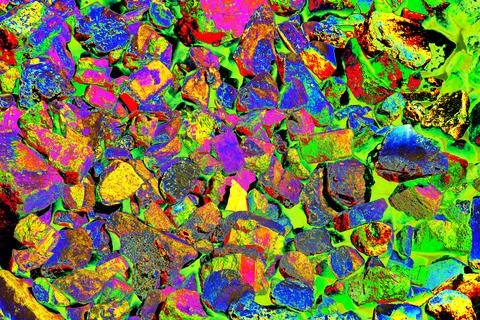 Pile of broken bricks, changed colors. Bright colorful background. Stock Photos