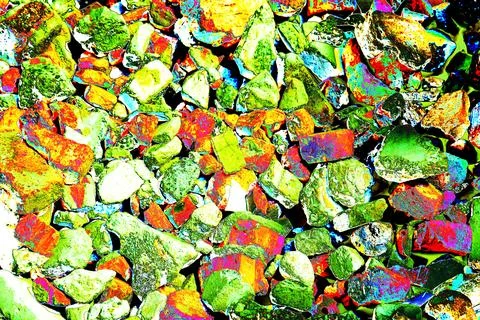 Pile of broken bricks, changed colors. Bright colorful background. Stock Photos