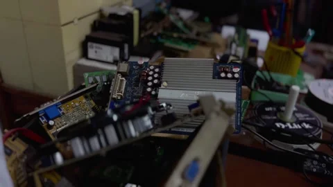 Pile of broken computer circuit boards. VGA card, LAN Card, Memory, RAM. Video stock 281575382