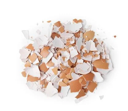 Pile of broken eggshells isolated on white, top view Foto stock