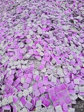 Pile of broken old ceramic mosaic tiles in pink Stock Photos