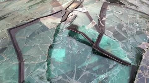 Pile of broken windshields - heap of cracked windscreens at a dump, due to Stock Footage 232953666
