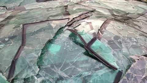 Pile of broken windshields - heap of cracked windscreens at a dump, due to Stock Footage 232954513