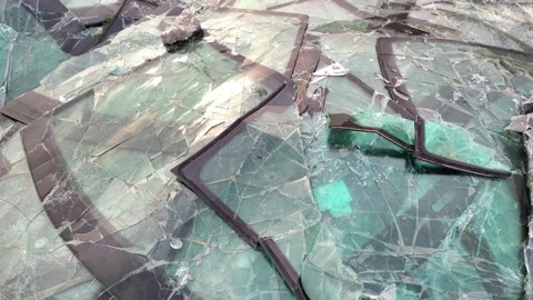 Pile of broken windshields - heap of cracked windscreens at a dump, due to Stock Footage 232955964