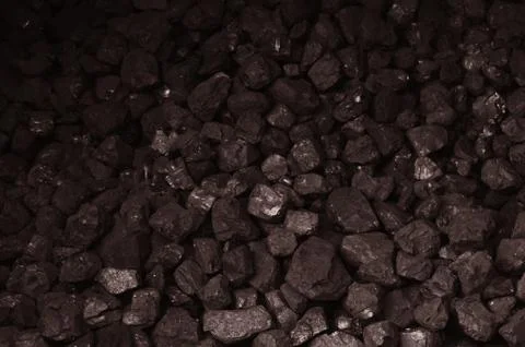 Pile of brown coal texture Stock Photos