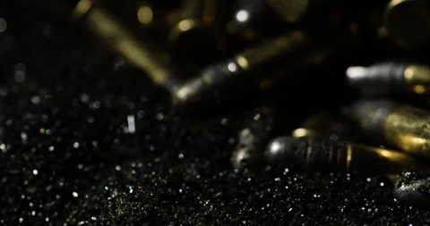 Pile Bullets Of 22 Long Rifles Fall On Gunpowder. Selective Focus Shot Stock Footage 264564965