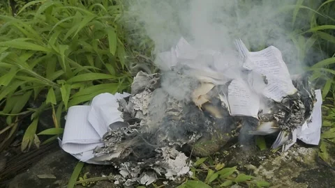 A pile of burned papers Stock Footage 296143934