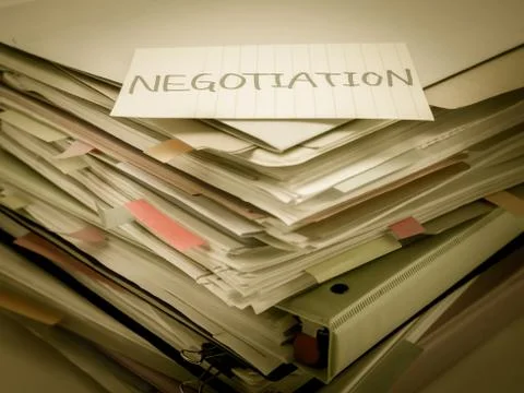 The Pile of Business Documents; Negotiation Stock Photos