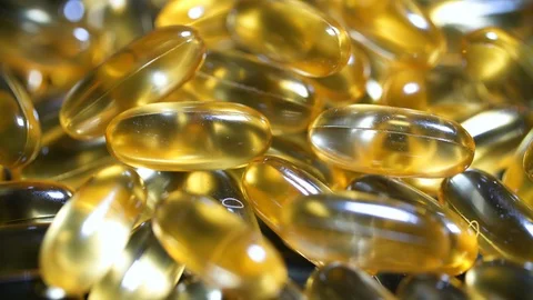 Pile of capsules Omega 3. Close up, top view close up macro Video stock 110901595
