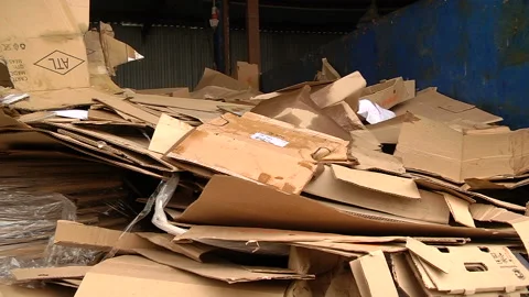 A pile of cardboard packaging ready for pressing Stock Footage 104646393