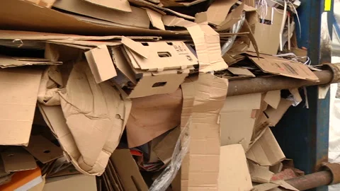 A pile of cardboard packaging ready for pressing Stock Footage 104646563