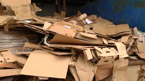 A pile of cardboard packaging ready for pressing Stock Footage 104646677