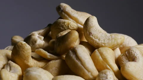 Pile of cashew nut kernels rotating Stock Footage 61692197