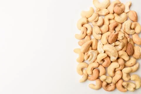 Pile of Cashew nuts on white background. tasty food with healthy fats Stock Photos
