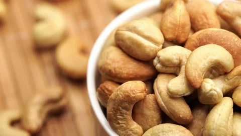 Pile cashew nuts without shell, rotates, close up. Stock Footage 238836331