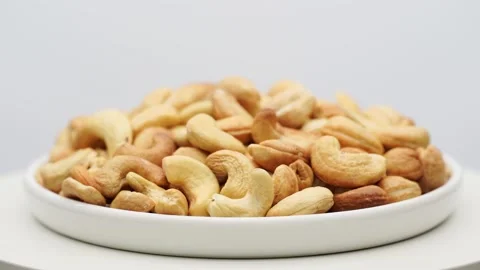 Pile cashew nuts without shell, rotates, close up. Stock Footage 238837339