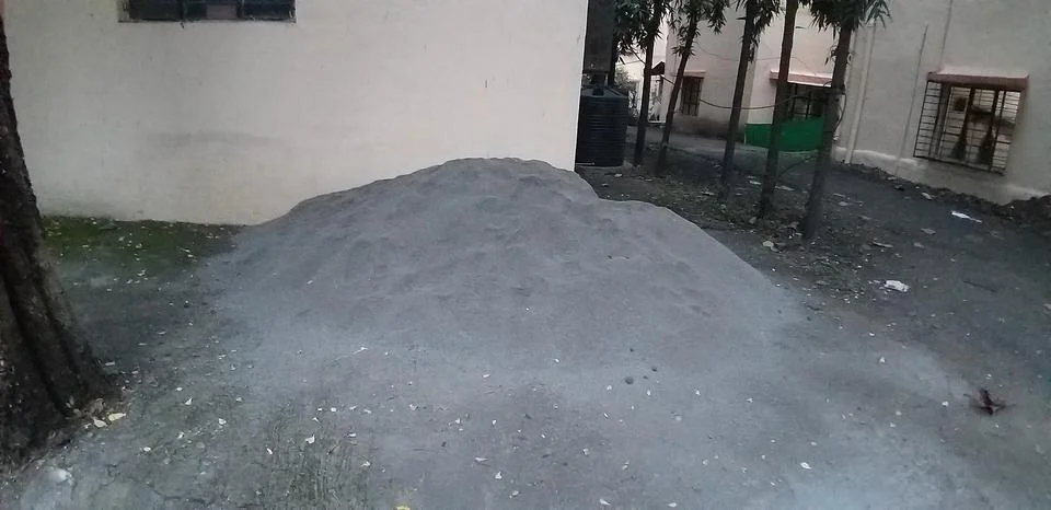 Pile of cement on a construction site Stock Photos