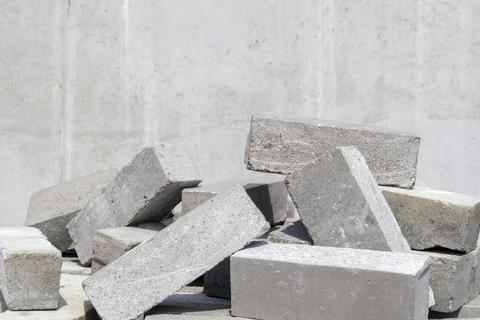 A pile of cement type bricks. Solid brick is used for construction. Lots of l Stock Photos
