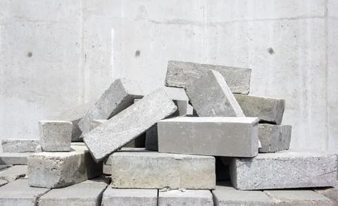 A pile of cement type bricks. Solid brick is used for construction. Lots of l Stock Photos