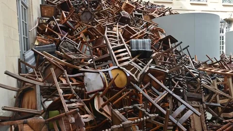 Pile of chairs stacked on display Stock Footage 286862398