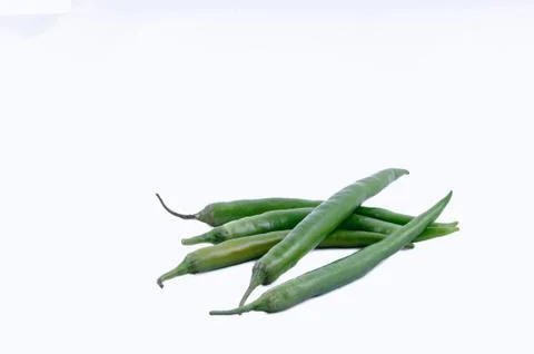 Pile of chillies on white background Stock Photos