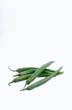 Pile of chillies on white background Stock Photos