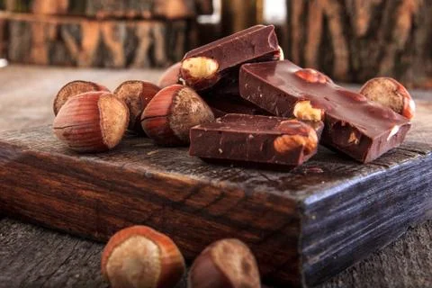 Pile of chocolate bars with nuts Stock Photos