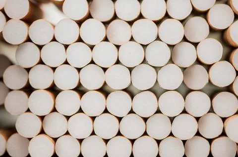 Pile of cigarettes background Stock Photos