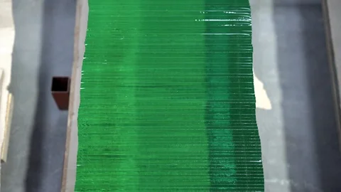 Pile of clear glass elements. Stack of glass sheets cut to size in glass Stock Footage 124060909