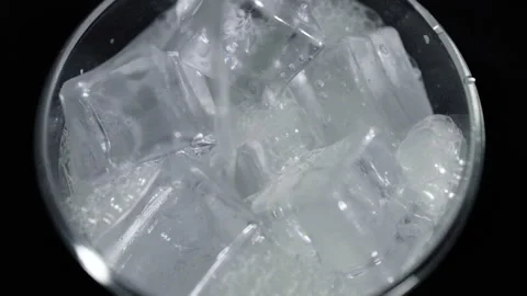 Pile of Clear Ice Cubes Closeup on White Background Stock Footage 340123847