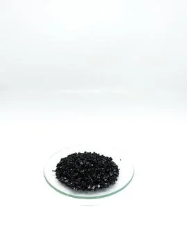Pile of coconut shell activated carbon powder for water purification Stock Photos