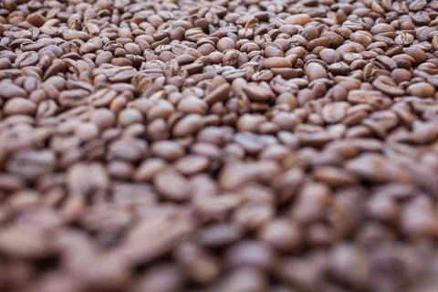 Pile of coffee beans. Background. Stock Photos