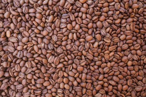 Pile of coffee beans. Background. Stock Photos