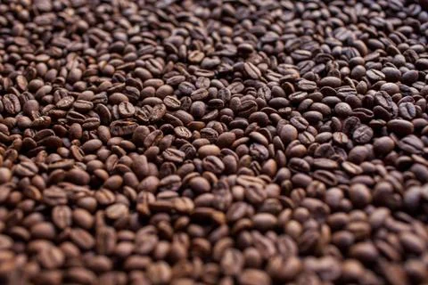 Pile of coffee beans. Background. Stock Photos
