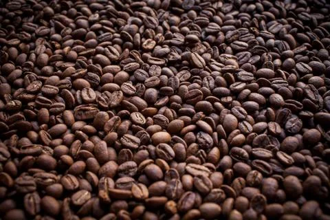 Pile of coffee beans. Background. Stock Photos