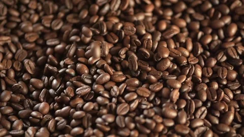 Pile of coffee beans with some of them scattered Stock Footage 305187648