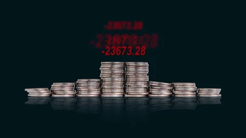 A pile of coins and graphics. Stock Footage 232600544
