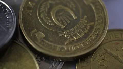 A pile of coins close-up.  Macro Stock Footage 70874894