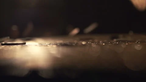 Pile of coins falling on the yellow table. Economic and financial crisis. Salary Stock Footage 199487419