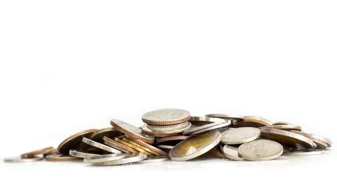 Pile of coins on white background. selective focus. Saving coins money concep Stock Photos
