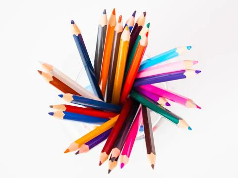 Pile of colored pencils close up in creative concept copy space Stock Photos