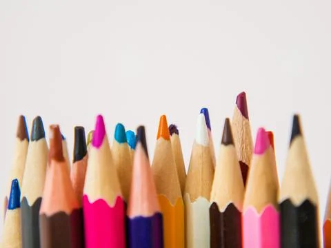 Pile of colored pencils close up in creativity concept Stock Photos