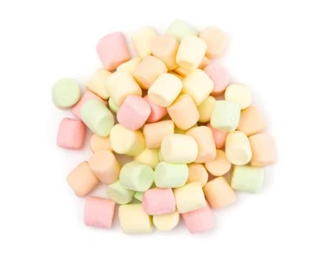 A Pile of Colorful Fruit Flavored Marshmallows on a White Background Stock Photos