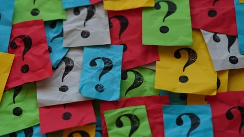 A pile of colorful paper notes with question marks on them. Stock Footage 321831130