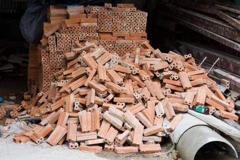 Pile of common building bricks Stock Photos