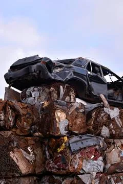 A pile of compressed cars in blocks for processing Stock Photos