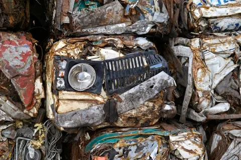 A pile of compressed cars in blocks for processing Stock Photos